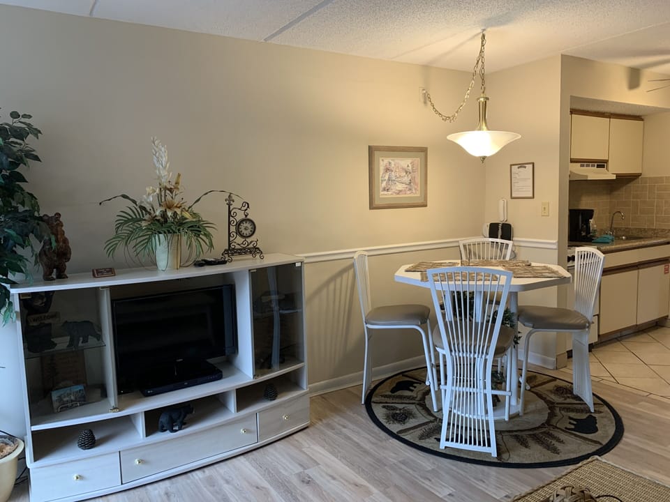 Condo, 1 Bedroom (705) | Living area | TV, fireplace