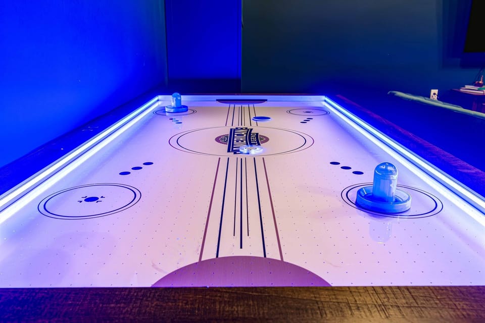 Air hockey just got an upgrade. Fast hands and bragging rights required.