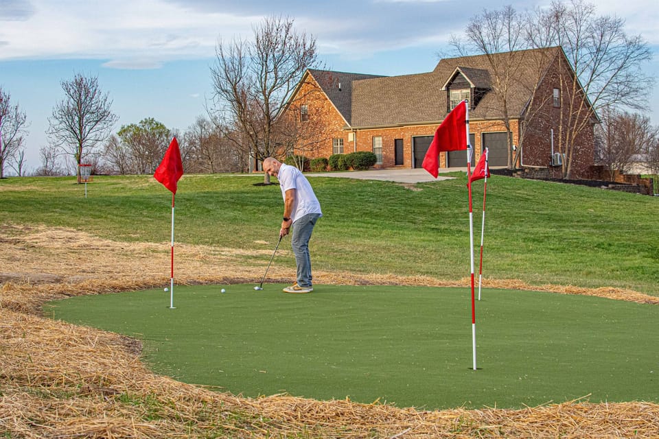 Perfect your swing on the private putting green.