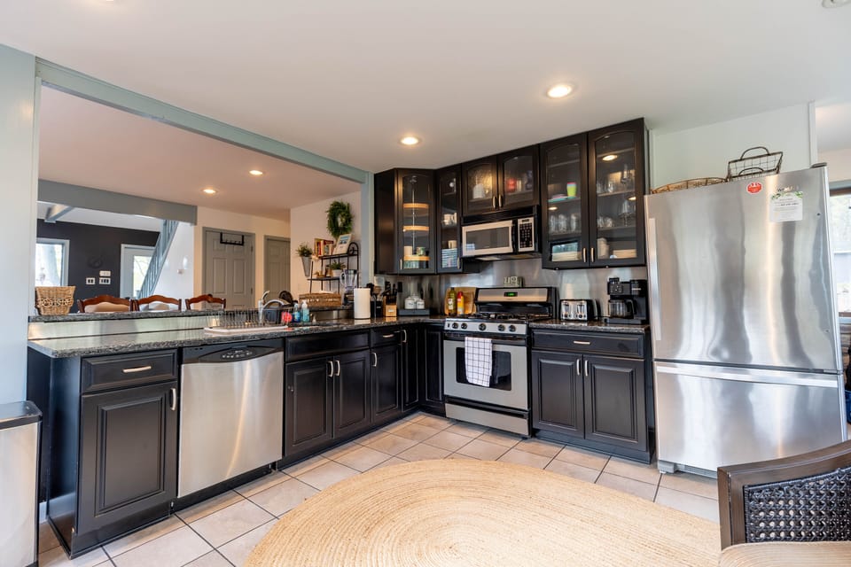 Fully stocked kitchen with coffee bar, cooking essentials, and kid essentials.