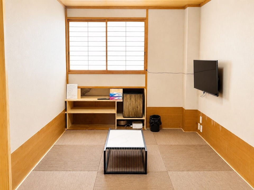 Comfort Double Room, Slope side | Living area | TV, heated floors
