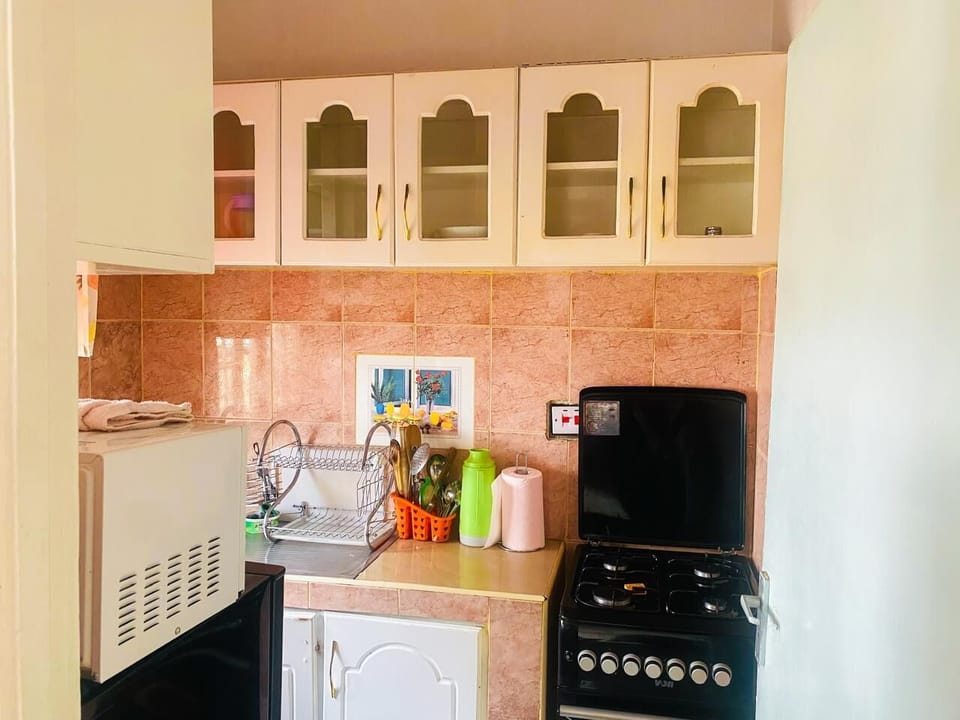 Family Villa, Garden View | Private kitchen | Fridge, microwave, oven, cookware/dishes/utensils