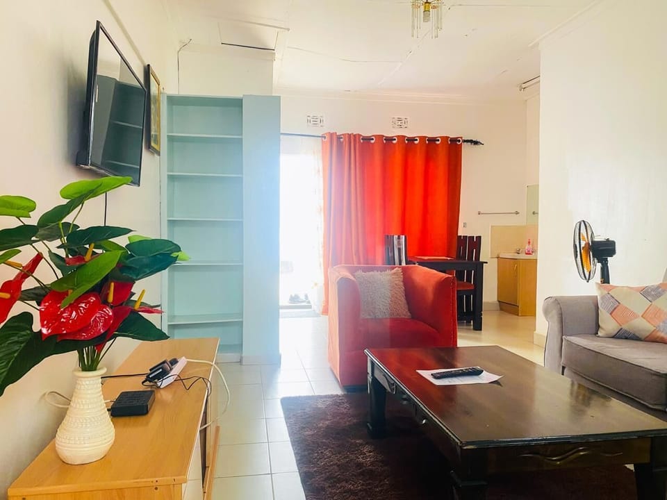 Family Villa, Garden View | Living area | 24-inch Smart TV with digital channels