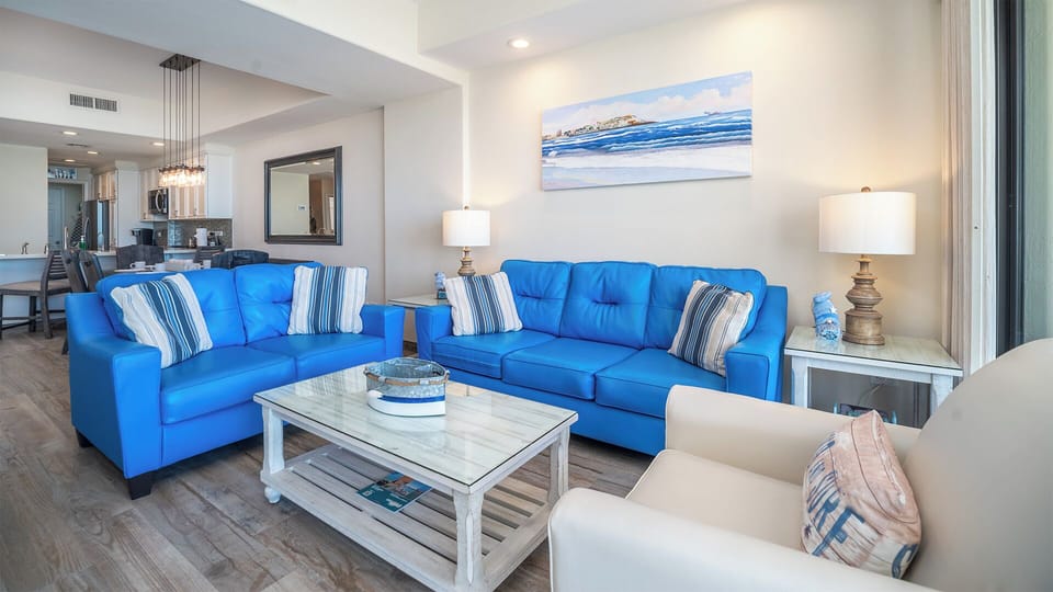 twin sofas and easy chair