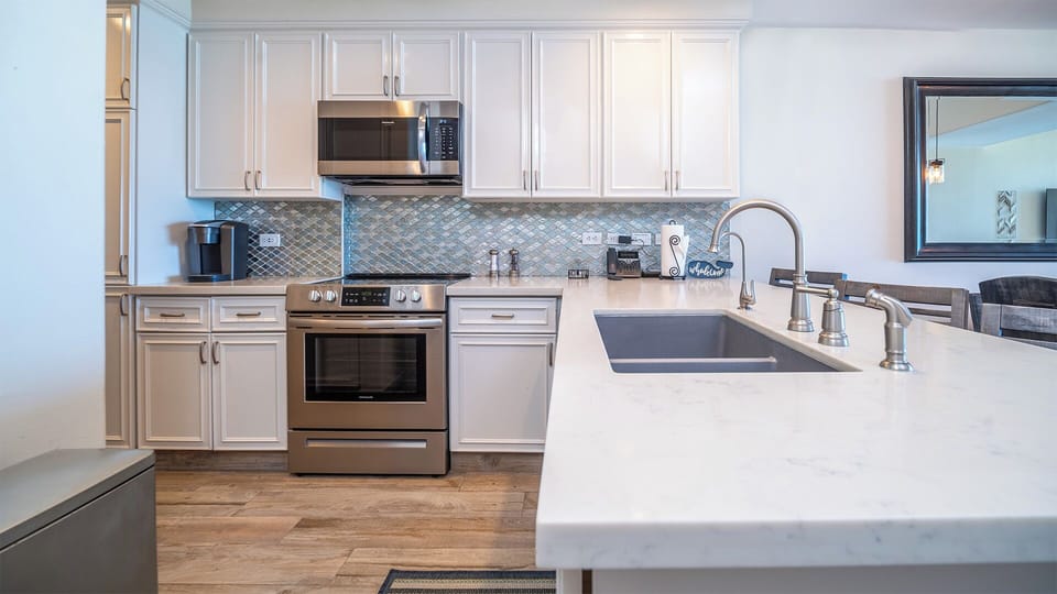 THe remodeled kitchen has a lot of room.