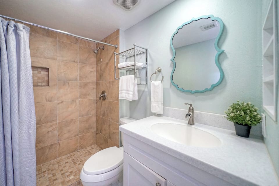 Bathroom 2 offers a shower. (Pour Me a Vacation)
