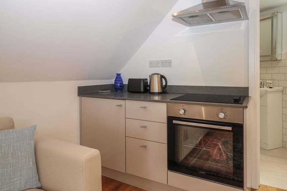 Fridge, electric kettle, toaster, cookware/dishes/utensils
