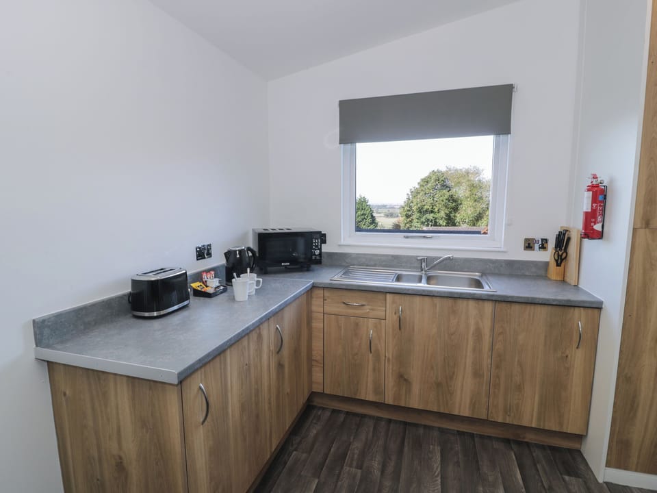 Fridge, electric kettle, toaster, cookware/dishes/utensils