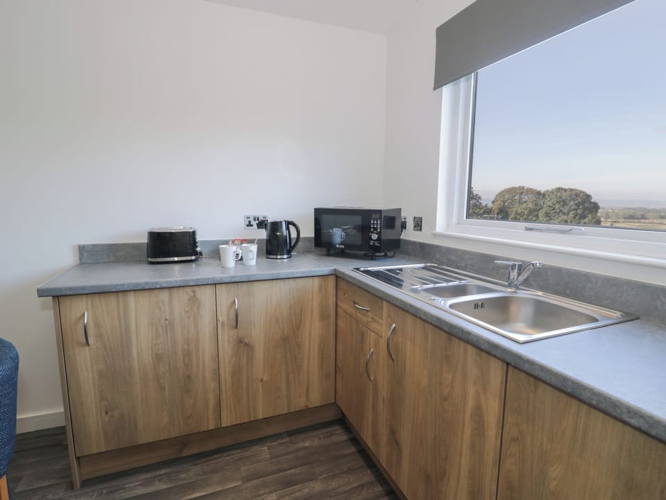 Fridge, electric kettle, toaster, cookware/dishes/utensils