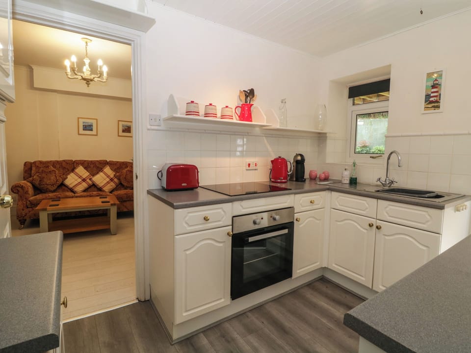 Fridge, electric kettle, cookware/dishes/utensils