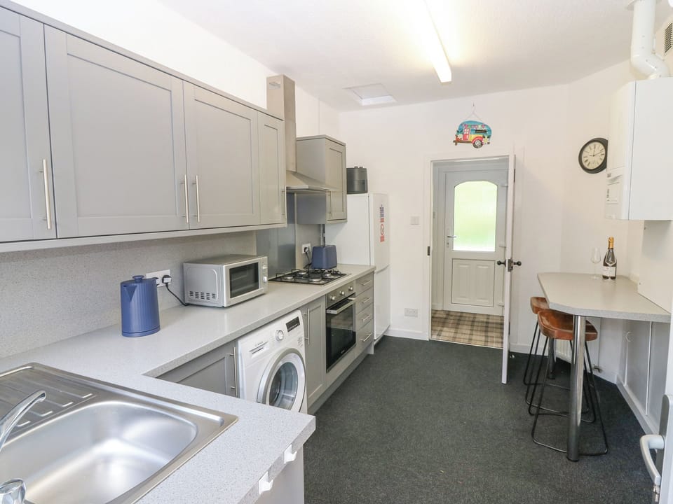 Fridge, electric kettle, toaster, cookware/dishes/utensils