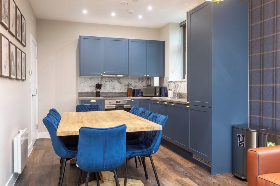 Open plan kitchen and living room with TV area