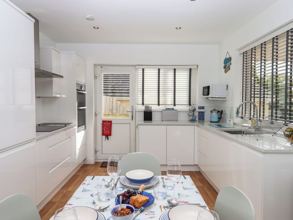 Fridge, dishwasher, electric kettle, cookware/dishes/utensils