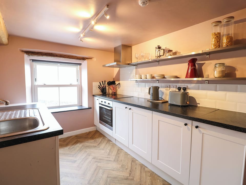Fridge, electric kettle, toaster, cookware/dishes/utensils