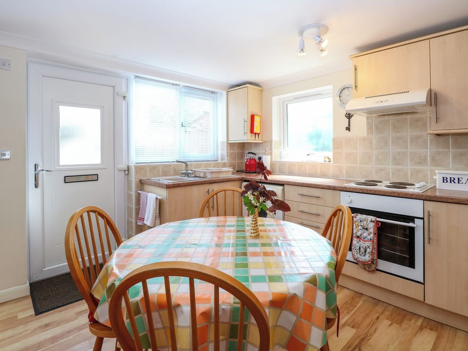 Fridge, electric kettle, toaster, cookware/dishes/utensils