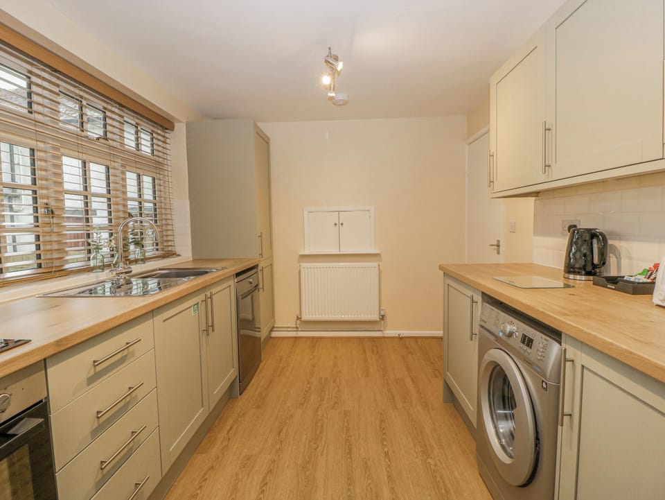 Fridge, dishwasher, electric kettle, cookware/dishes/utensils