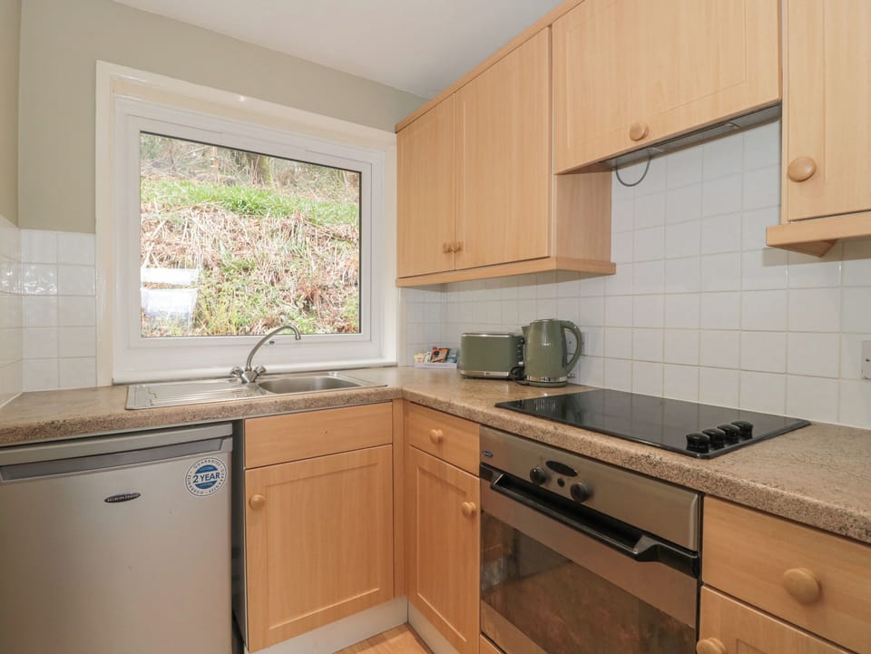 Fridge, electric kettle, toaster, cookware/dishes/utensils