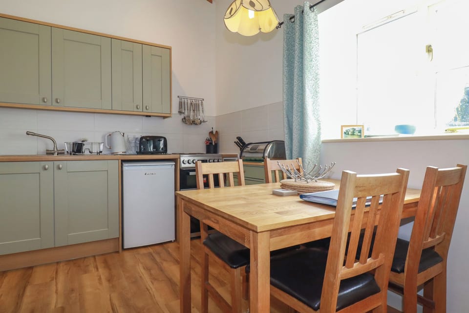 Fridge, electric kettle, toaster, cookware/dishes/utensils