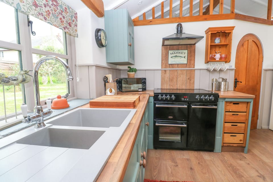 Fridge, dishwasher, electric kettle, cookware/dishes/utensils