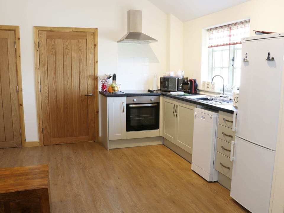 Fridge, dishwasher, electric kettle, cookware/dishes/utensils