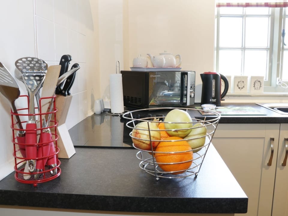 Fridge, dishwasher, electric kettle, cookware/dishes/utensils