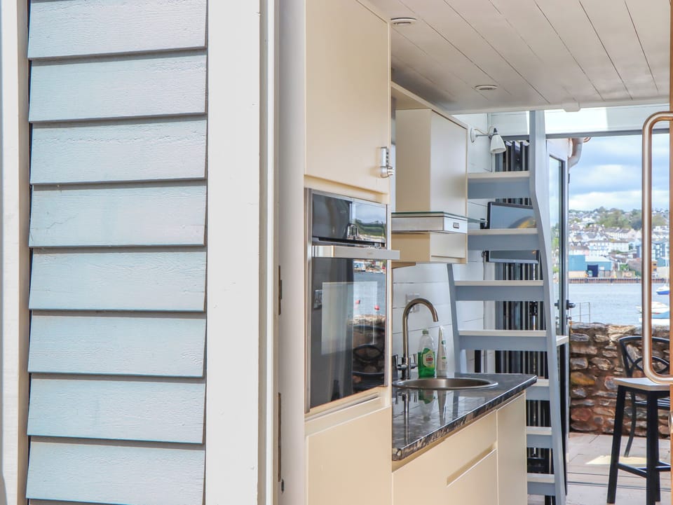 Fridge, electric kettle, toaster, cookware/dishes/utensils