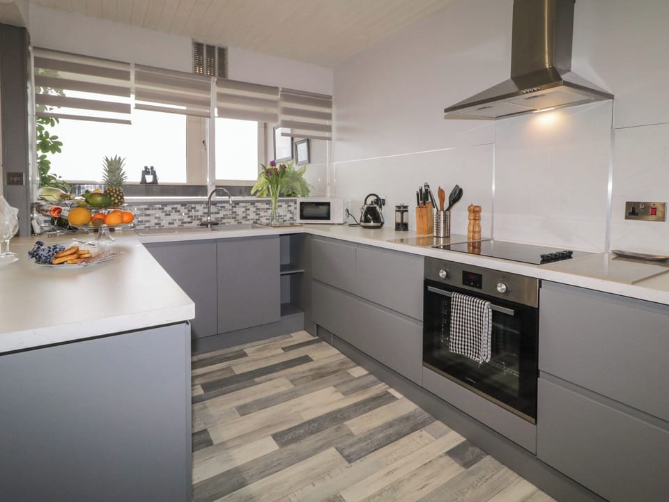 Fridge, electric kettle, cookware/dishes/utensils