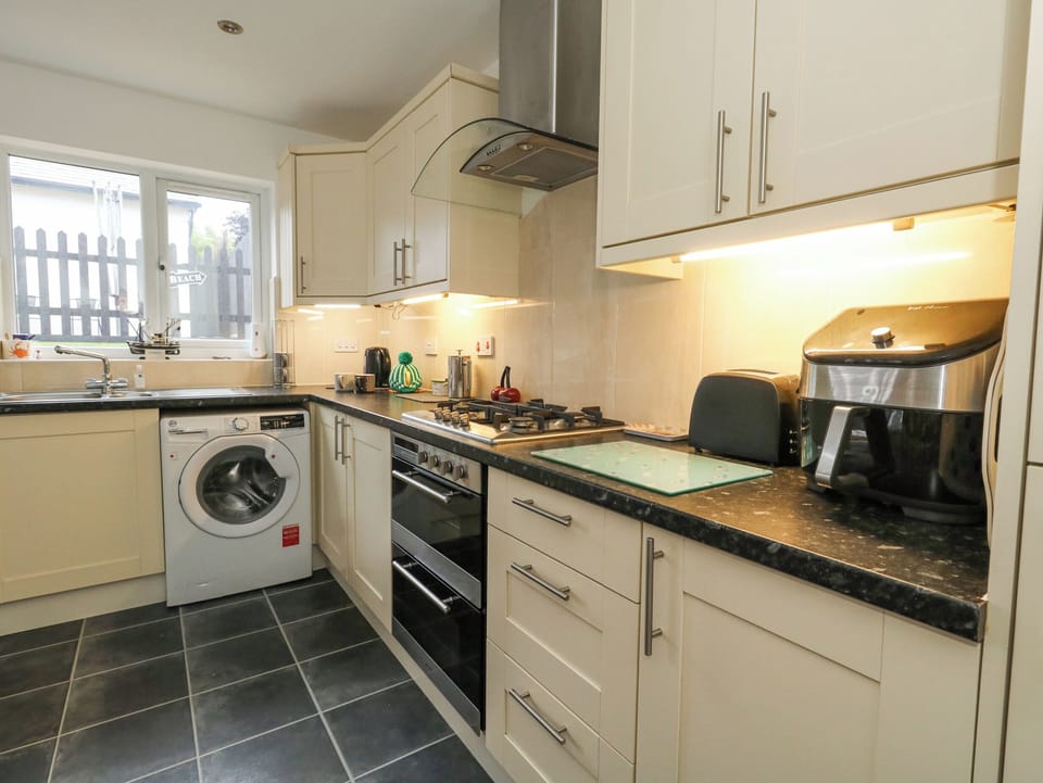 Fridge, dishwasher, electric kettle, cookware/dishes/utensils