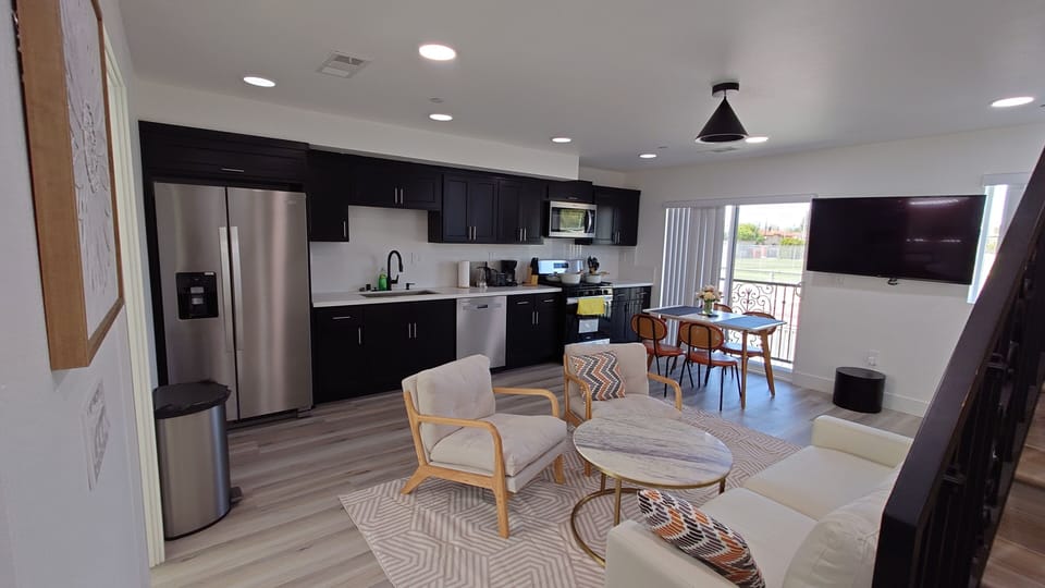 Standard Apartment, 3 Bedrooms, Balcony, Park View (Unit E) | Private kitchen | Shared fridge, microwave, coffee/tea maker, electric kettle