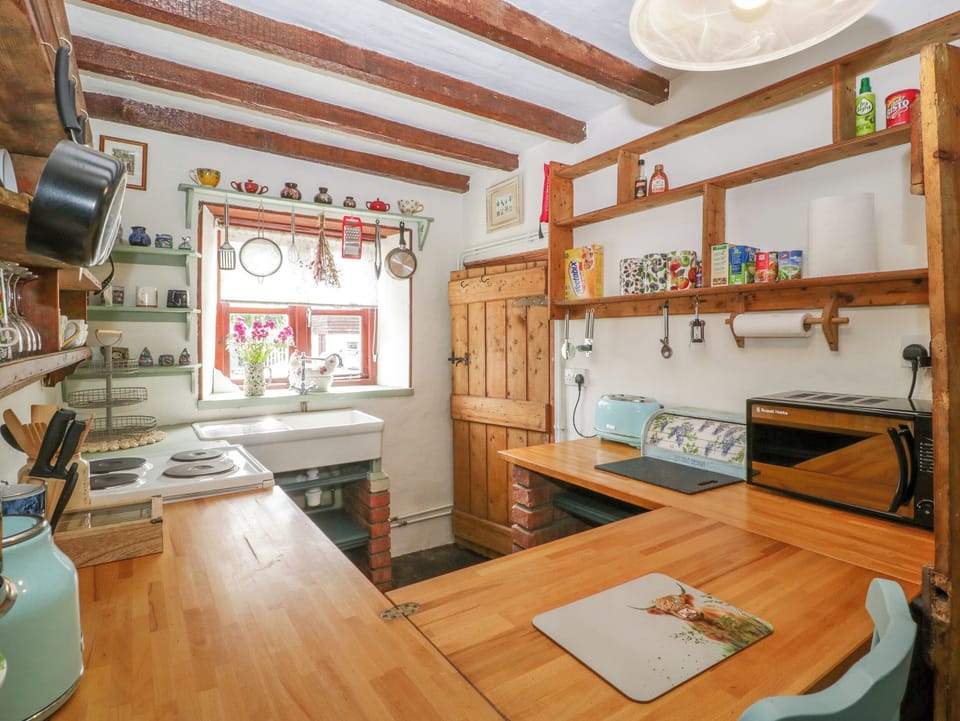 Fridge, electric kettle, toaster, cookware/dishes/utensils