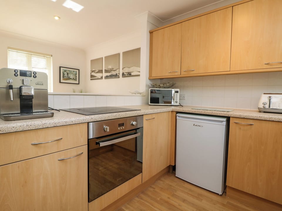 Fridge, electric kettle, toaster, cookware/dishes/utensils