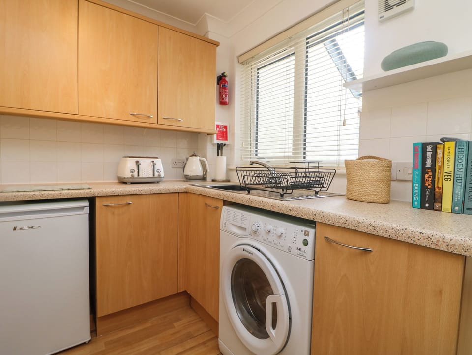 Fridge, electric kettle, toaster, cookware/dishes/utensils