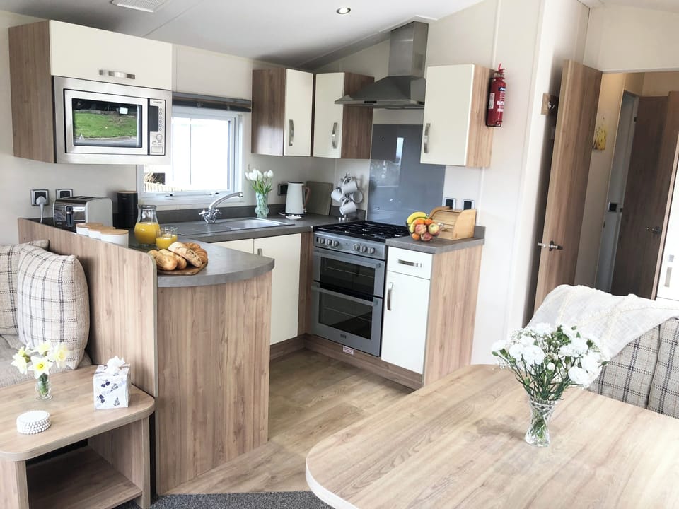 Fridge, electric kettle, toaster, cookware/dishes/utensils
