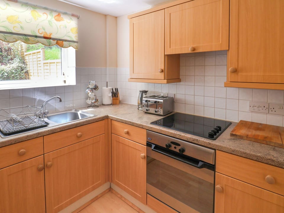 Fridge, electric kettle, toaster, cookware/dishes/utensils