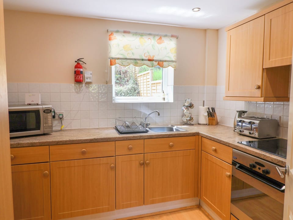 Fridge, electric kettle, toaster, cookware/dishes/utensils