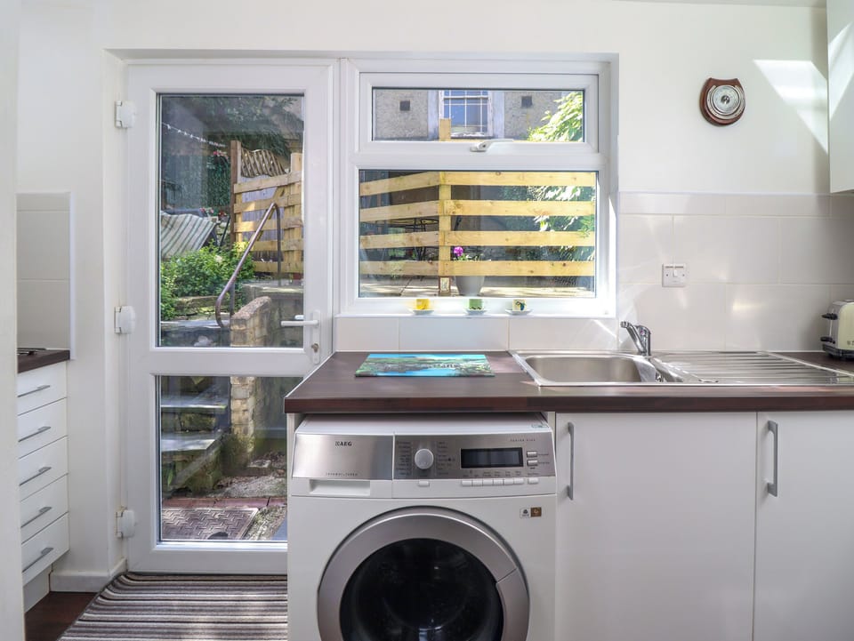 Fridge, electric kettle, toaster, cookware/dishes/utensils