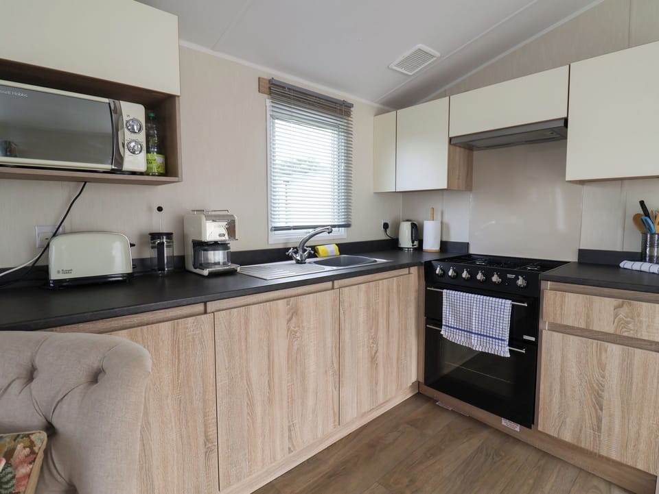 Fridge, electric kettle, toaster, cookware/dishes/utensils