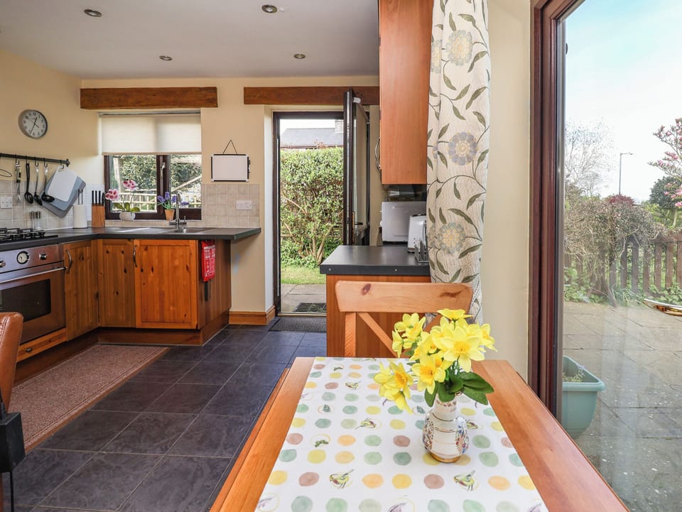 Fridge, electric kettle, toaster, cookware/dishes/utensils