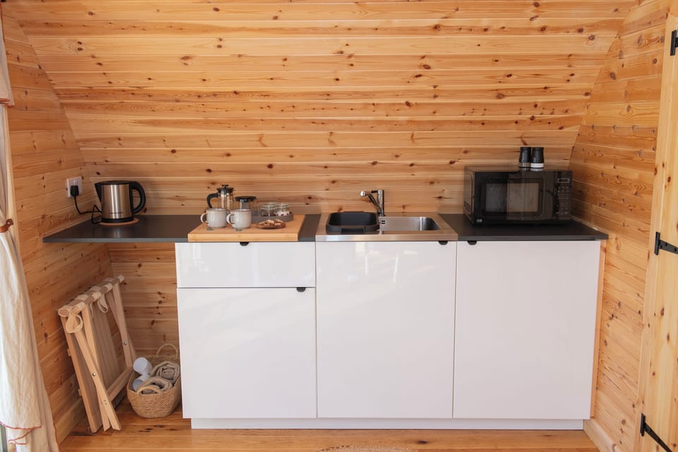 Fridge, electric kettle, toaster, cookware/dishes/utensils