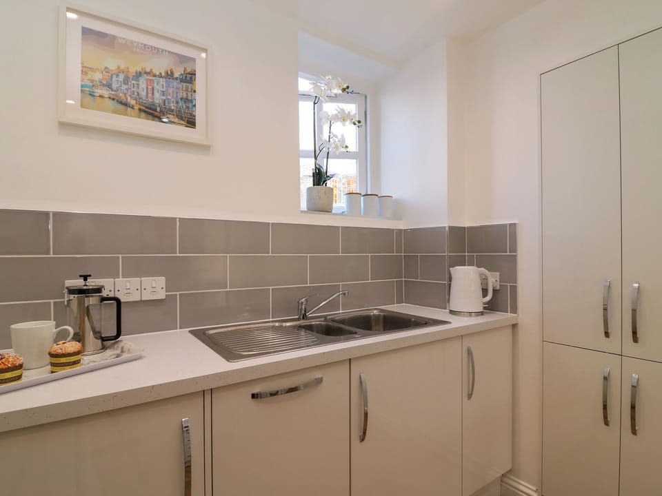 Fridge, dishwasher, electric kettle, toaster