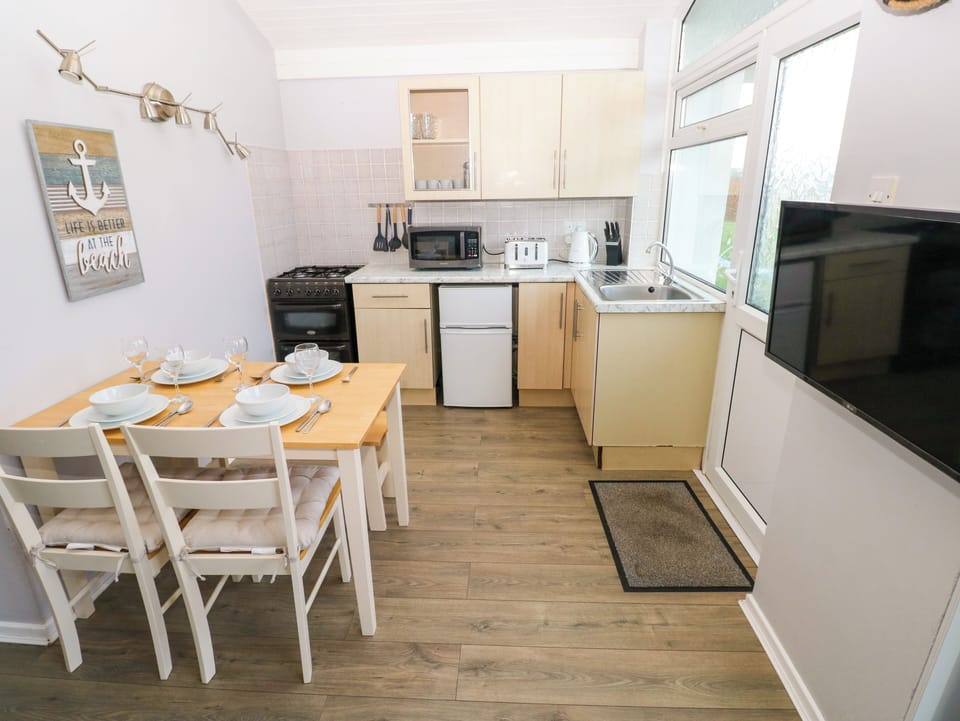 Fridge, electric kettle, toaster, cookware/dishes/utensils