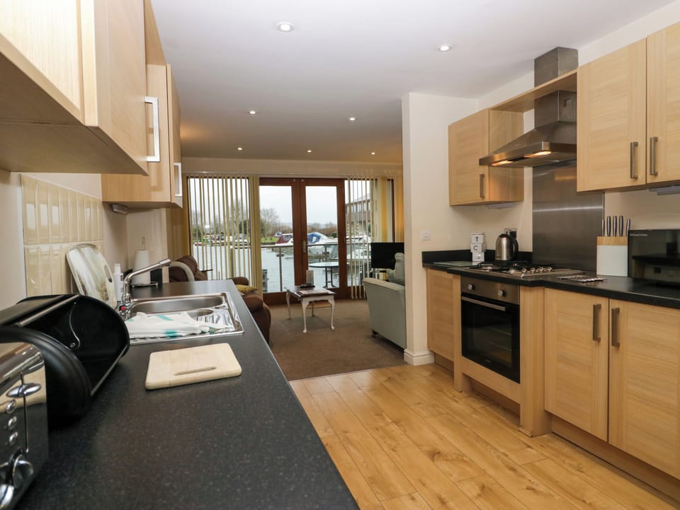 Fridge, dishwasher, electric kettle, cookware/dishes/utensils