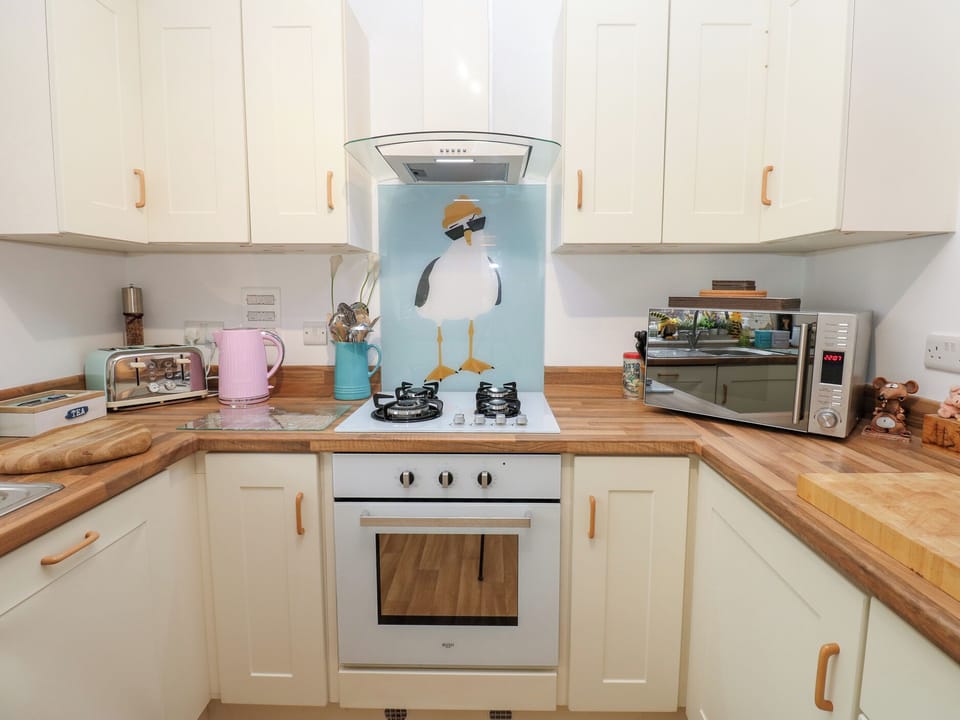 Fridge, dishwasher, electric kettle, cookware/dishes/utensils
