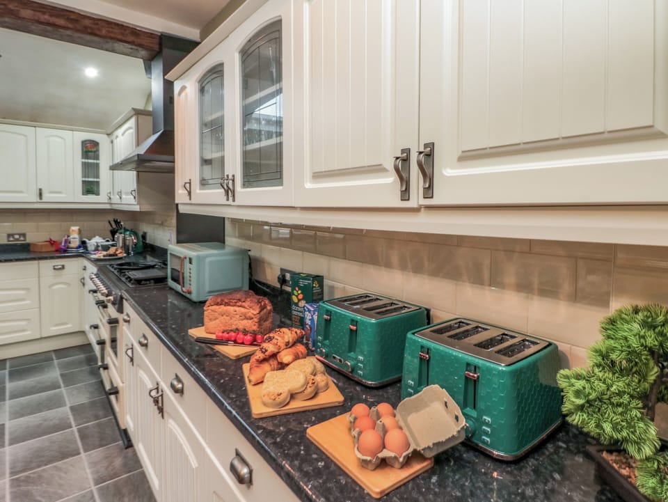 Fridge, dishwasher, electric kettle, toaster