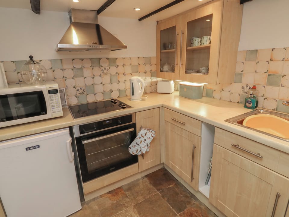 Fridge, electric kettle, toaster, cookware/dishes/utensils