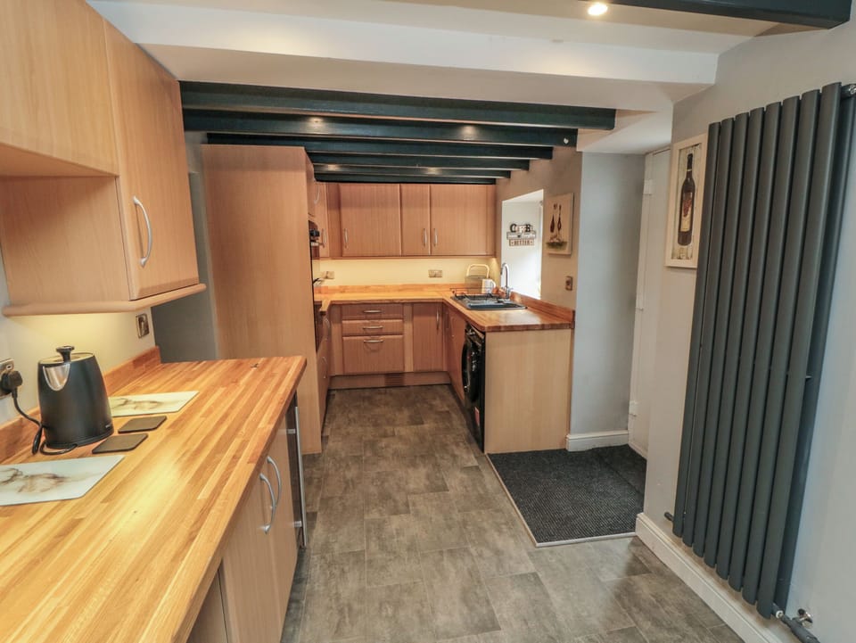 Fridge, electric kettle, toaster, cookware/dishes/utensils