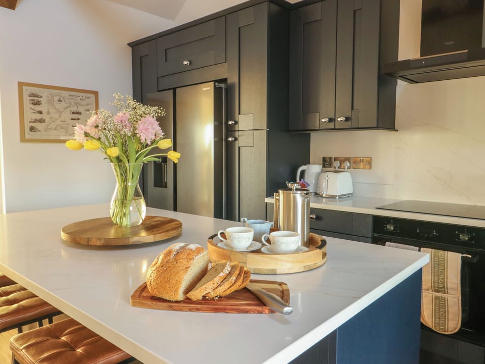 Fridge, dishwasher, electric kettle, cookware/dishes/utensils