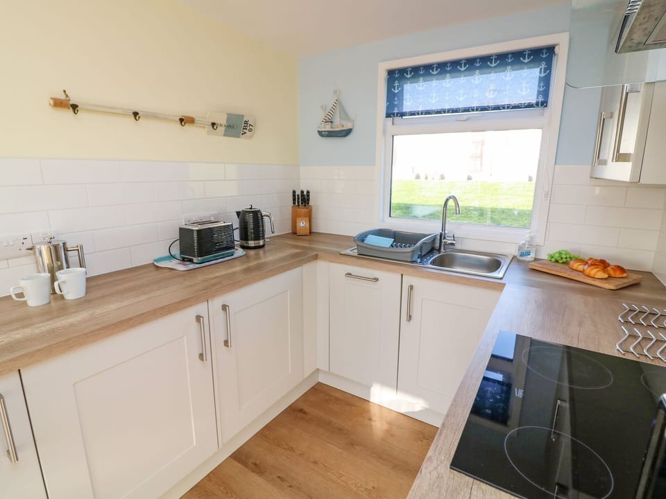 Fridge, dishwasher, electric kettle, toaster