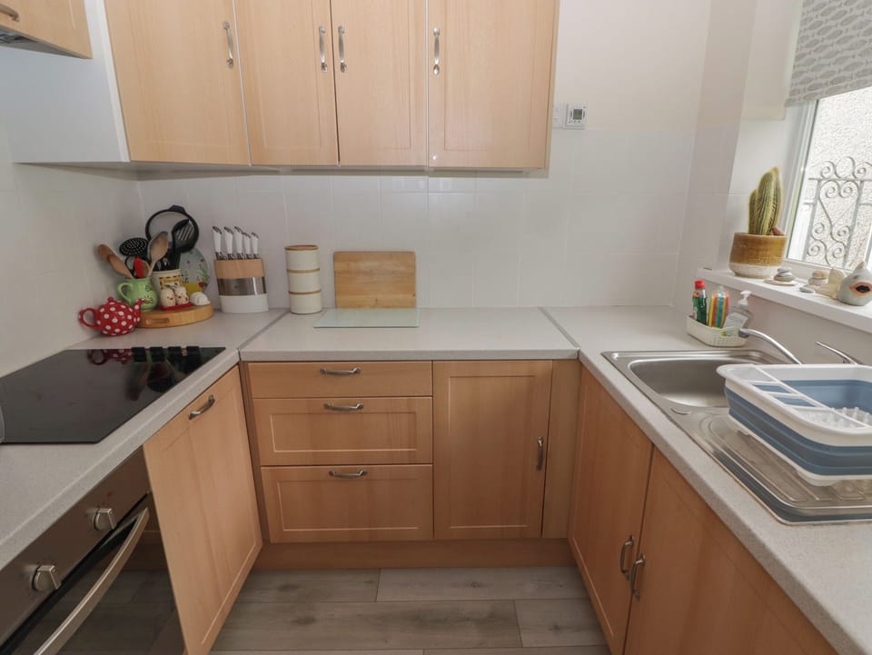 Fridge, electric kettle, toaster, cookware/dishes/utensils
