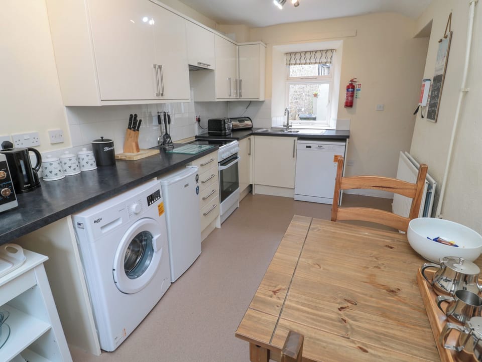 Fridge, electric kettle, toaster, cookware/dishes/utensils